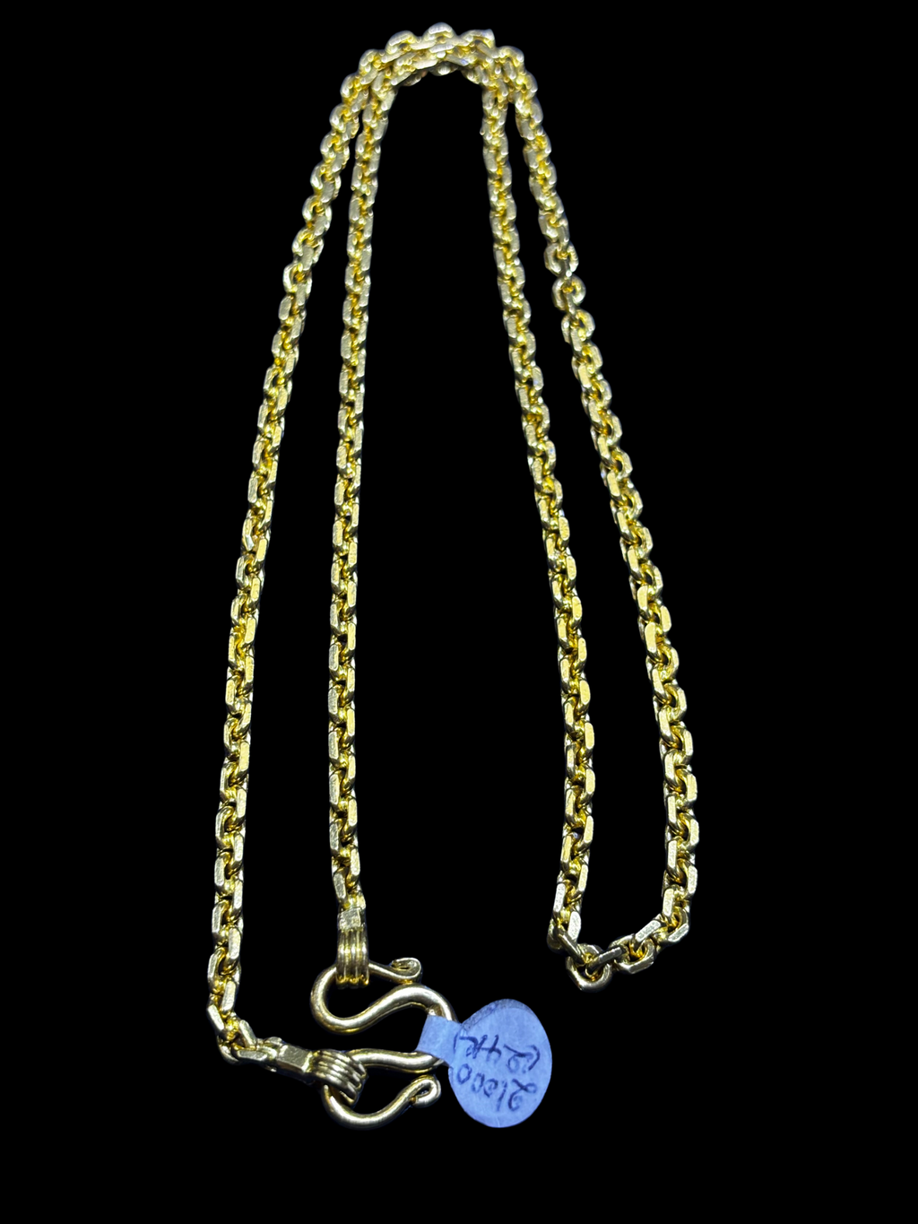 24K gold chain link necklace with clasp on a black background